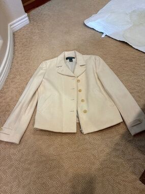 Woman’s beautiful Ralph Lauren suit jacket.Cream colored.